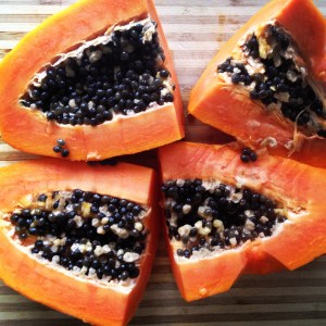Papaya Freshly cut papaya ready to chop and place in the freezer to blend in my morning smoothies! Don't forget to save the seeds and freeze them too... great for healing :)